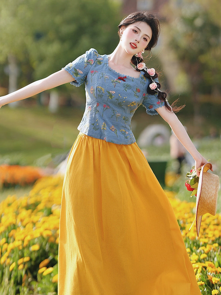 Disney wears a Hong Kong-style slim-fit embroidered top with a yellow skirt for coffee break, a chic and beautiful small set.