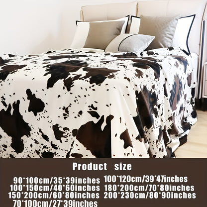 1pc Cozy Cow Print Plush Blanket - Ultra-Soft, Warm, and Lightweight for All-Season Comfort, Perfect for Daughters, Adults, Students, and Teens - Great for Indoors, Outdoors, Camping, and Travel