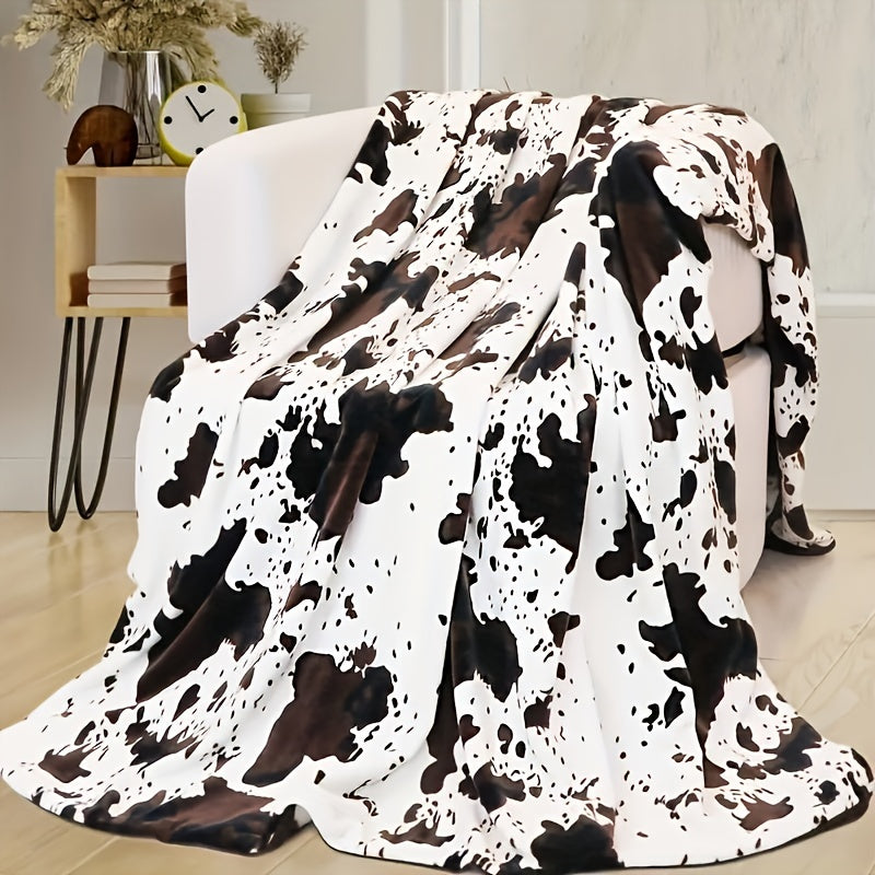 1pc Cozy Cow Print Plush Blanket - Ultra-Soft, Warm, and Lightweight for All-Season Comfort, Perfect for Daughters, Adults, Students, and Teens - Great for Indoors, Outdoors, Camping, and Travel