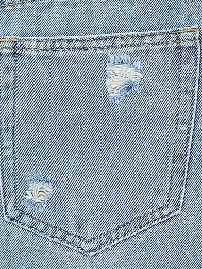 Womens Ripped Denim Shorts - Fashion-Forward Style with Trendy Raw Hem - Vintage Distressed Blue Wash