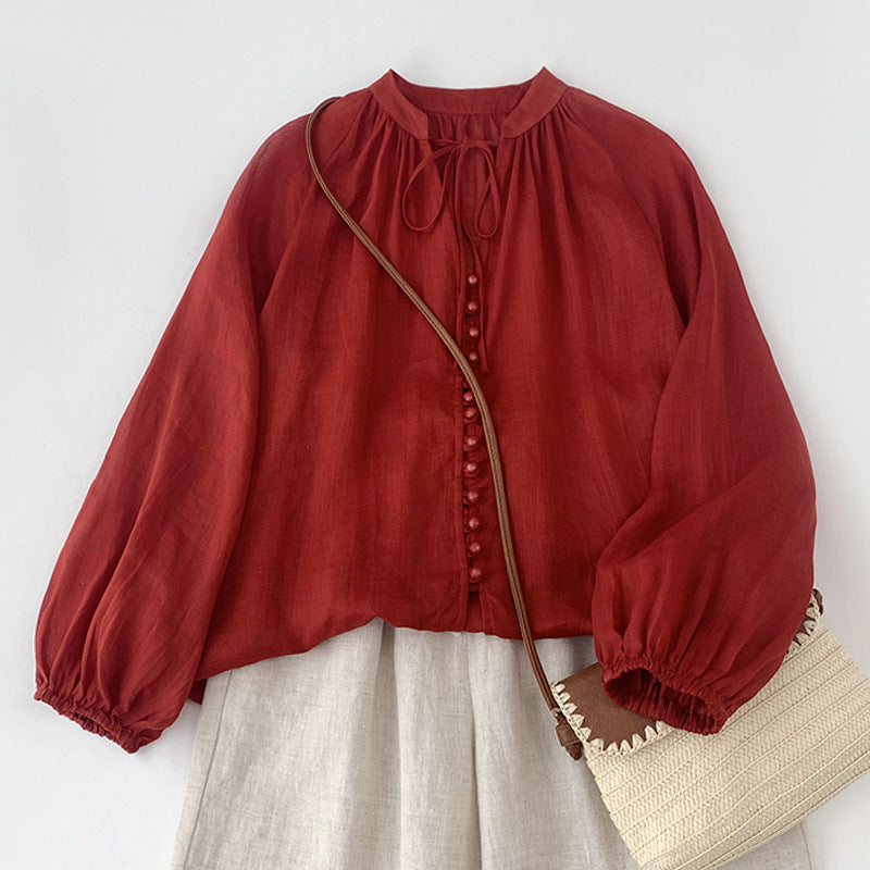 literary and retro solid color single-row button-up strap-up elastic sleeve shirt women's lantern sleeves loose small bag buckle sunscreen