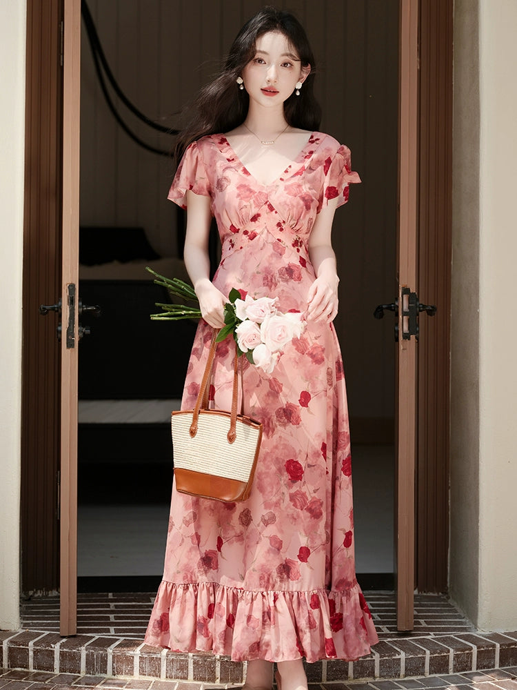 Go to a windy place and let red beans and roses wear a  red floral dress, which is a great-looking skirt in summer.