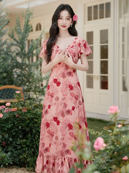 Go to a windy place and let red beans and roses wear a  red floral dress, which is a great-looking skirt in summer.