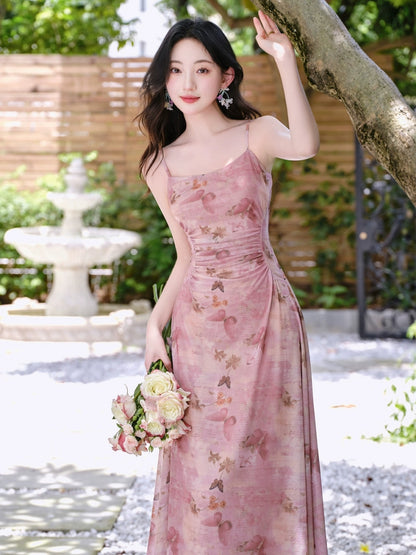 Summer wear beautiful small skirt pink floral suspender dress women's seaside vacation sunscreen cardigan two-piece set