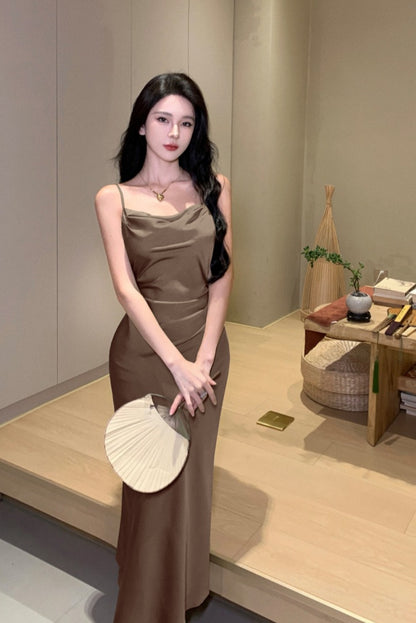 2025 high fashion temperament niche suspender skirt 2025 new commuter simple slim and thin medium and long skirt