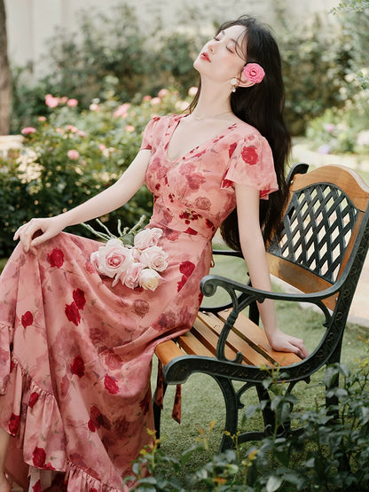 Go to a windy place and let red beans and roses wear a  red floral dress, which is a great-looking skirt in summer.