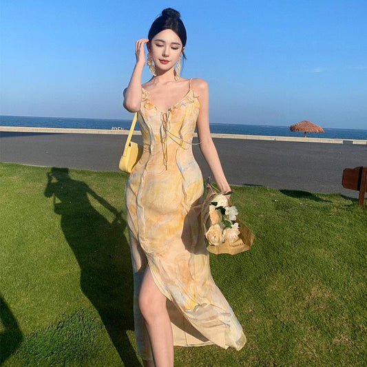 2025 Golden yellow robe seaside vacation style temperament dress Muse Fan Chaoxian fungus edge suspender floral beach dress