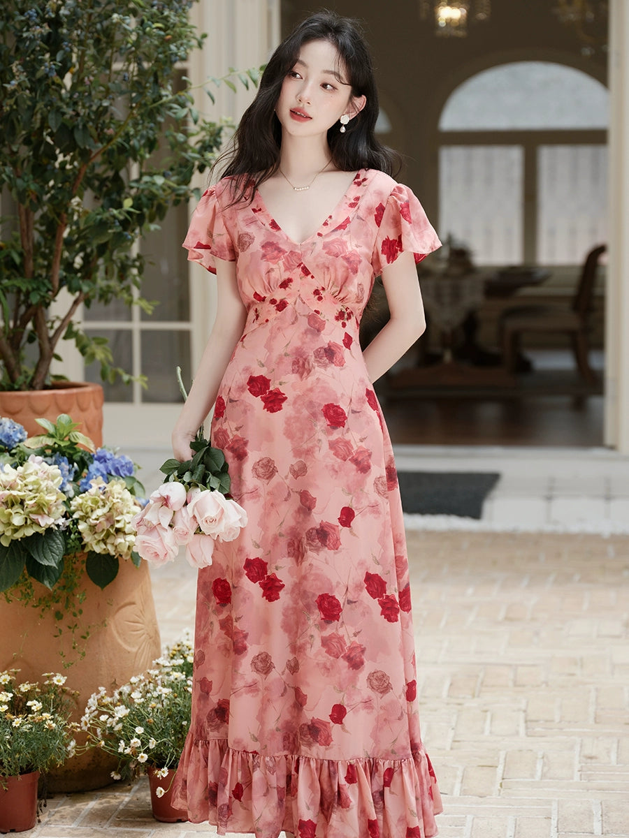Go to a windy place and let red beans and roses wear a  red floral dress, which is a great-looking skirt in summer.