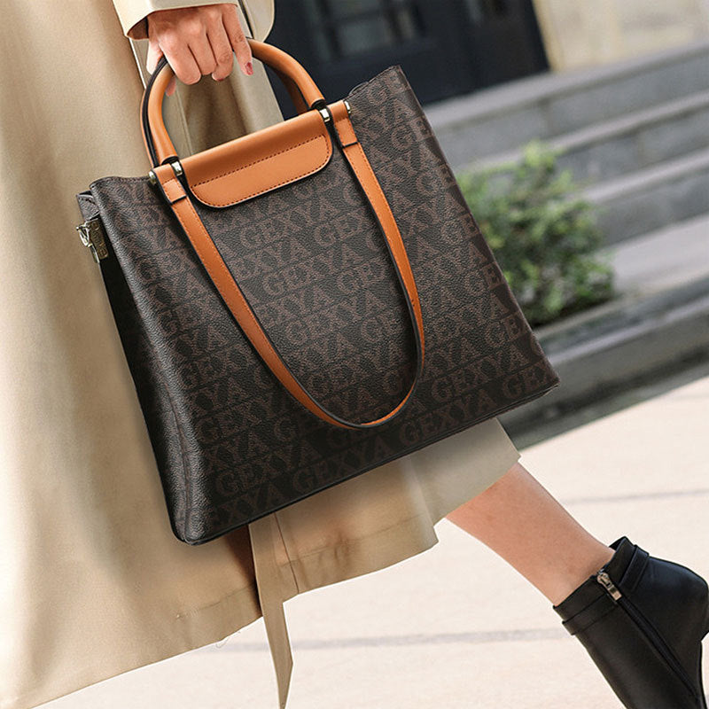 2025 Bucket bag women's new tote bag commuter women's bag large-capacity printing fashionable versatile mother shoulder bag wholesale