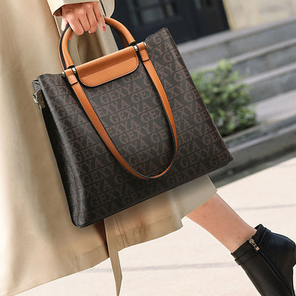 2025 Bucket bag women's new tote bag commuter women's bag large-capacity printing fashionable versatile mother shoulder bag wholesale