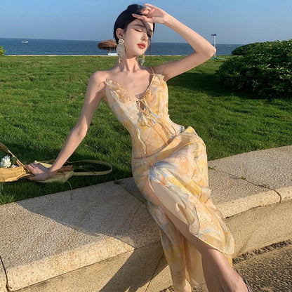 2025 Golden yellow robe seaside vacation style temperament dress Muse Fan Chaoxian fungus edge suspender floral beach dress