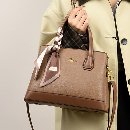 2025 Handbag Women's new splicing contrasting color bag Fashion high-end shoulder bag Large capacity commuter women's tote bag