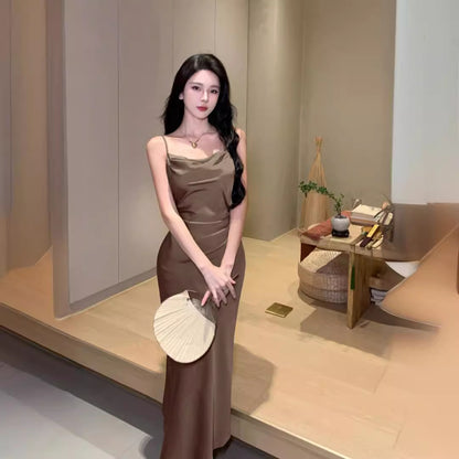 2025 high fashion temperament niche suspender skirt 2025 new commuter simple slim and thin medium and long skirt