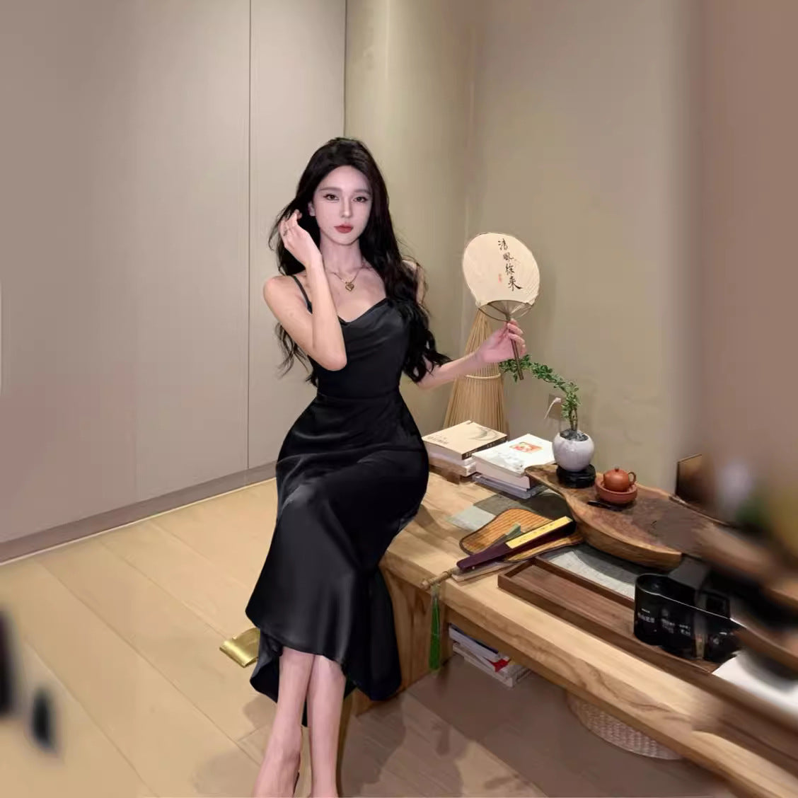 2025 high fashion temperament niche suspender skirt 2025 new commuter simple slim and thin medium and long skirt