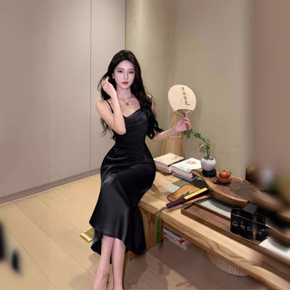 2025 high fashion temperament niche suspender skirt 2025 new commuter simple slim and thin medium and long skirt