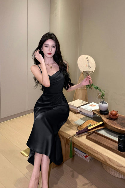 2025 high fashion temperament niche suspender skirt 2025 new commuter simple slim and thin medium and long skirt