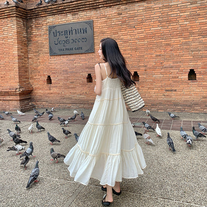 2025 gentle style beige holiday suspender skirt women's summer new temperament Muse fan high waist super good-looking dress