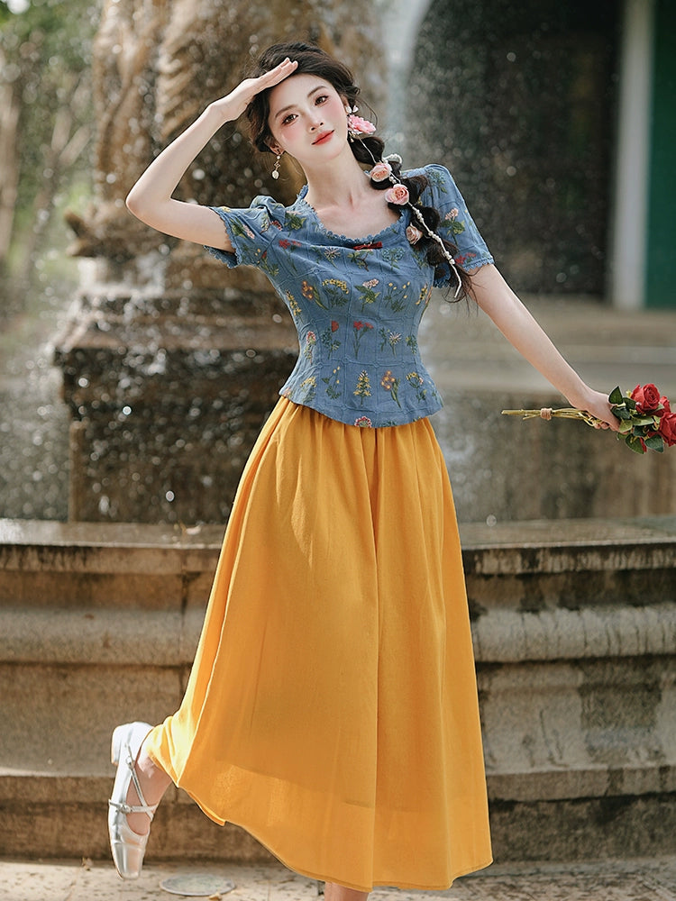 Disney wears a Hong Kong-style  slim-fit embroidered top with a yellow skirt for coffee break, a chic and beautiful small set.