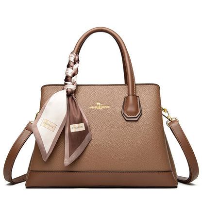 2025 Handbag Women's new splicing contrasting color bag Fashion high-end shoulder bag Large capacity commuter women's tote bag