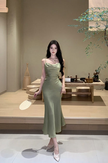 2025 high fashion temperament niche suspender skirt 2025 new commuter simple slim and thin medium and long skirt