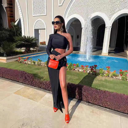 LOVEVOP 2023 new black long-sleeved hollow waist split fork  women's elastic dress slanted shoulder autumn and winter dress