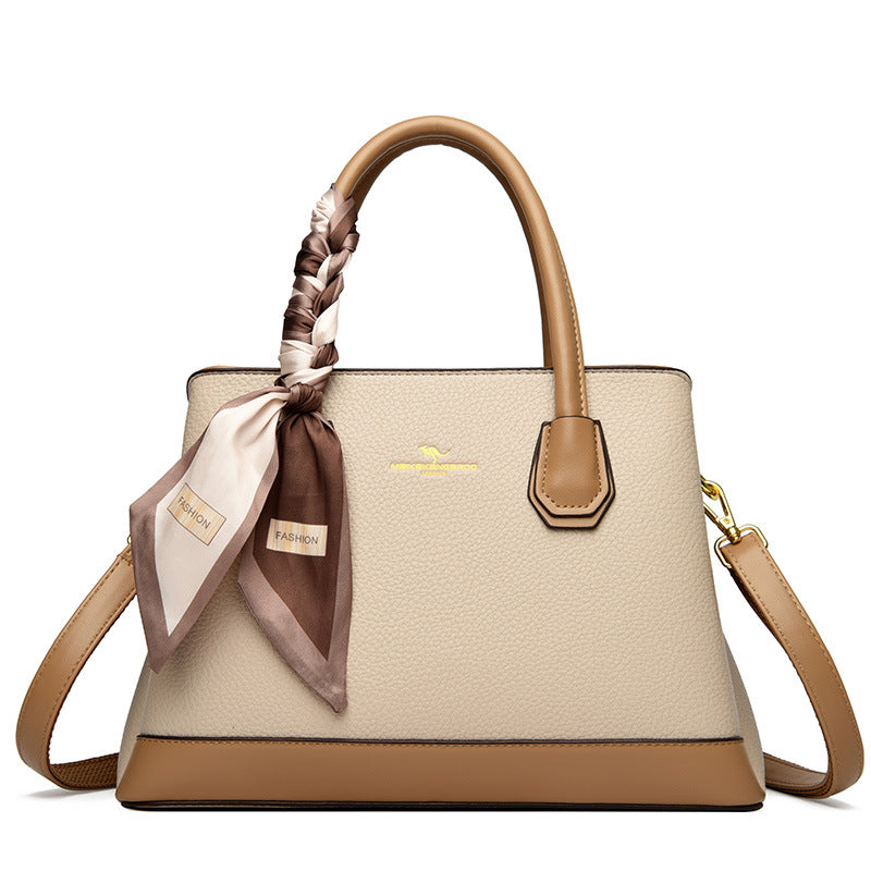 2025 Handbag Women's new splicing contrasting color bag Fashion high-end shoulder bag Large capacity commuter women's tote bag