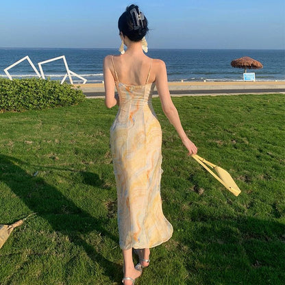 2025 Golden yellow robe seaside vacation style temperament dress Muse Fan Chaoxian fungus edge suspender floral beach dress