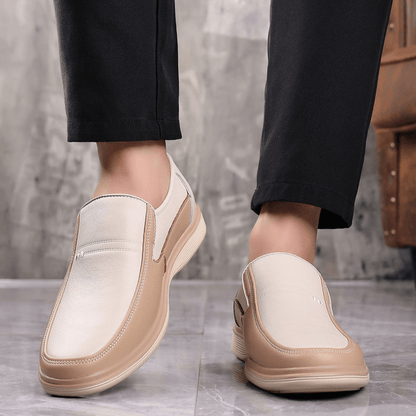 lovevop Breathable Cowhide Leather Slip-On Casual Shoes for Men with Hollow Out Design