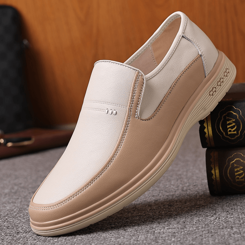 lovevop Breathable Cowhide Leather Slip-On Casual Shoes for Men with Hollow Out Design
